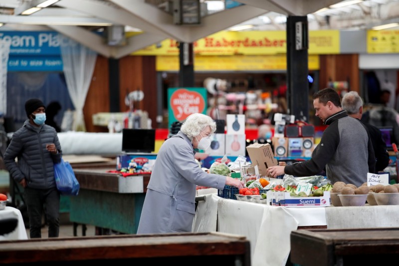 UK inflation jumps past Bank of England target, hits 2.1%