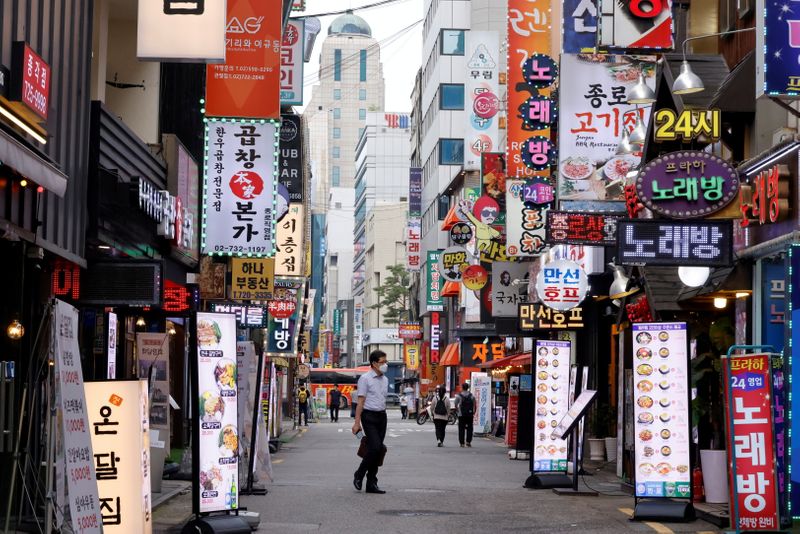 S.Korea central bank holds rates, signals tightening prospects