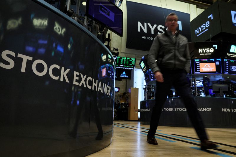 Wall Street closes lower after Fed minutes, inflation data